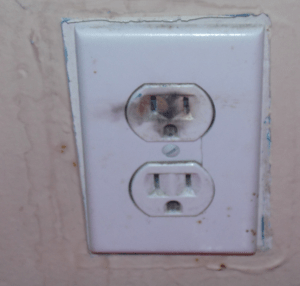 what does it mean when an electrical outlet sparks